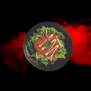 Chicken Katsu Salad with crispy chicken pieces on fresh mixed greens.