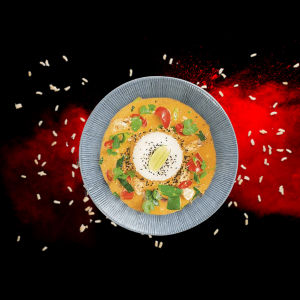 Chicken Raisukaree Curry served with steamed jasmine rice and vegetables.